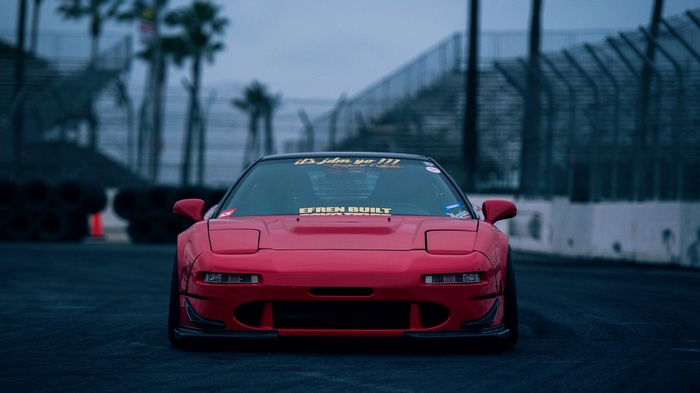 Red Honda NSX on a Race Track