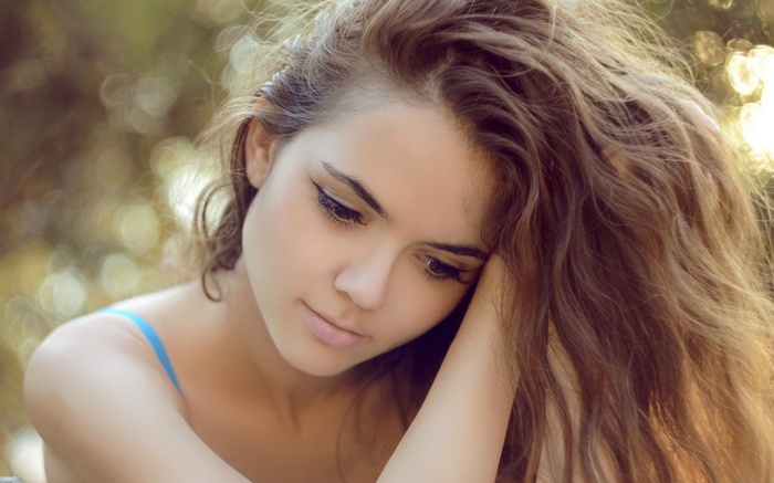 Portrait of a young woman with brown hair