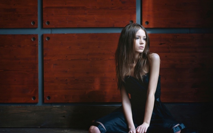 Ksenia Kokoreva in a black dress