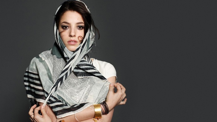 Olivia Thirlby wearing a headscarf and bracelets