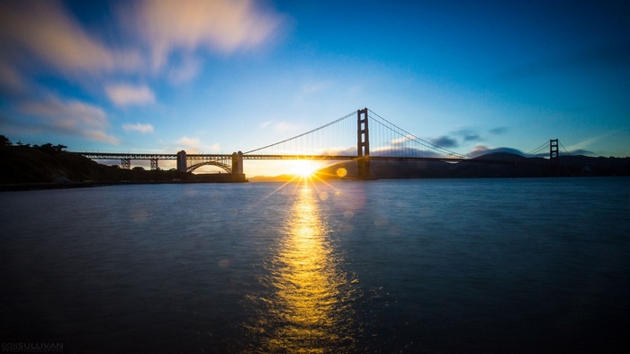 Golden Gate Bridge at Sunrise with Lens Flare