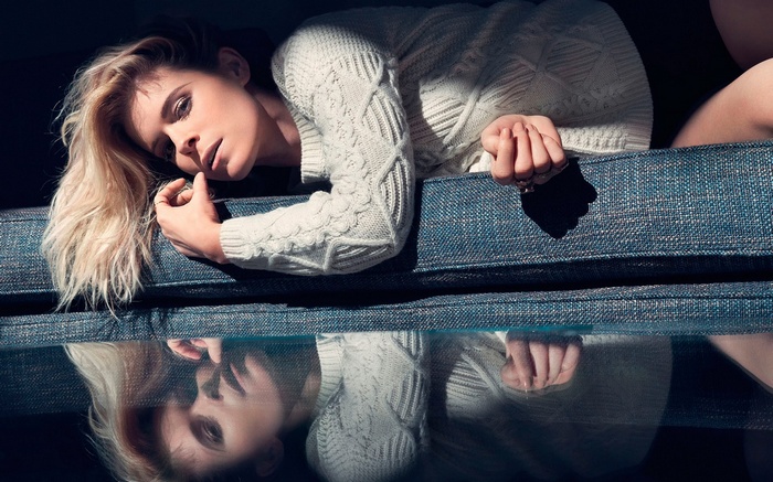 Kate Mara in a white sweater with reflection