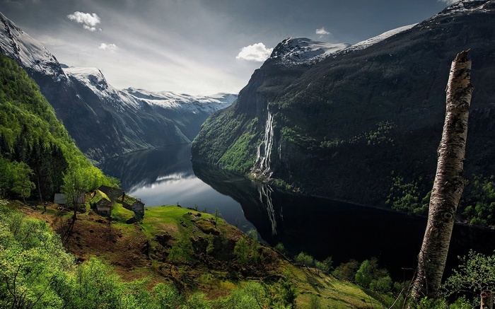 Geiranger Fjord with Waterfalls and Snowy Peaks