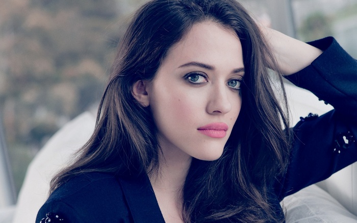 Kat Dennings in a black jacket