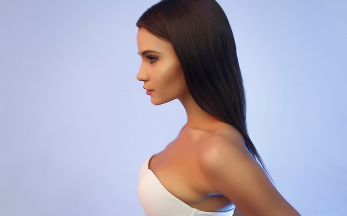 Woman in profile with dark hair