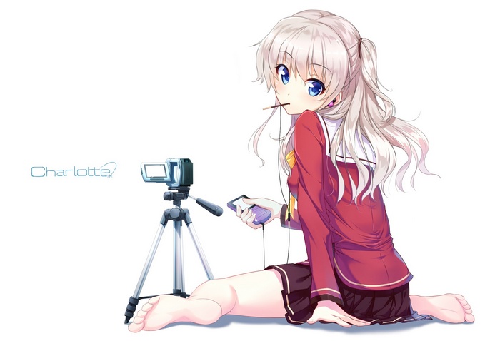 Nao Tomonori from Charlotte holding a video camera