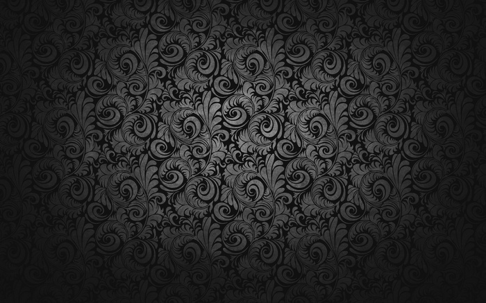 Dark floral pattern with swirling motifs