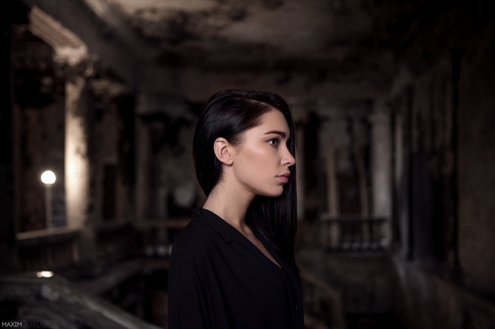 Woman with long dark hair by Maxim Guselnikov
