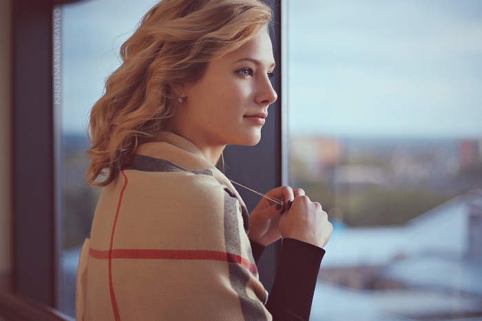 Kristina Nevskaya looking out a window