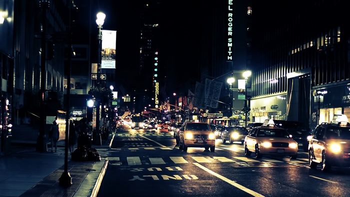 New York City street at night with taxis