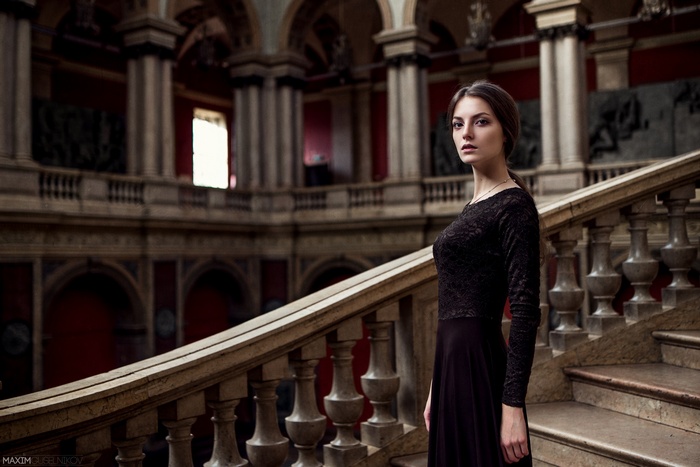Woman in black dress on stairs, Maxim Guselnikov