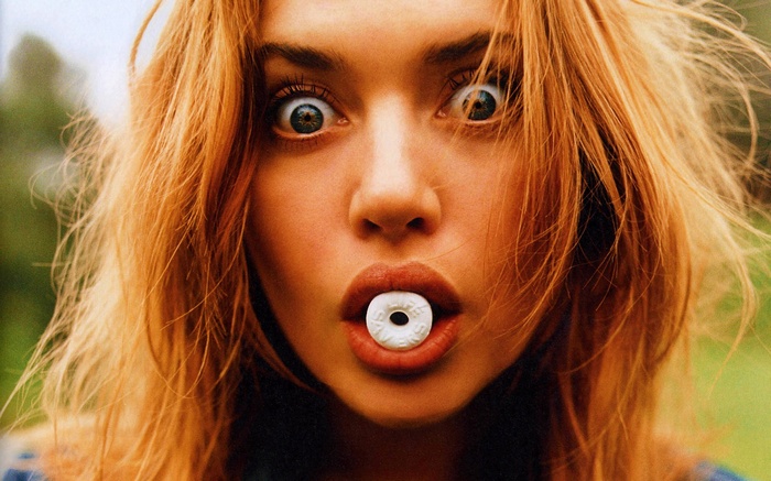Kate Winslet with a Life Savers candy in her mouth