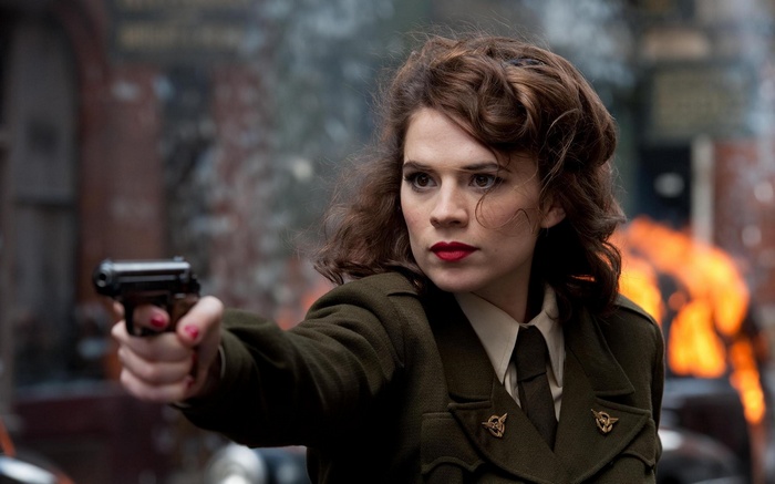 Peggy Carter holding a pistol in Captain America: The First Avenger