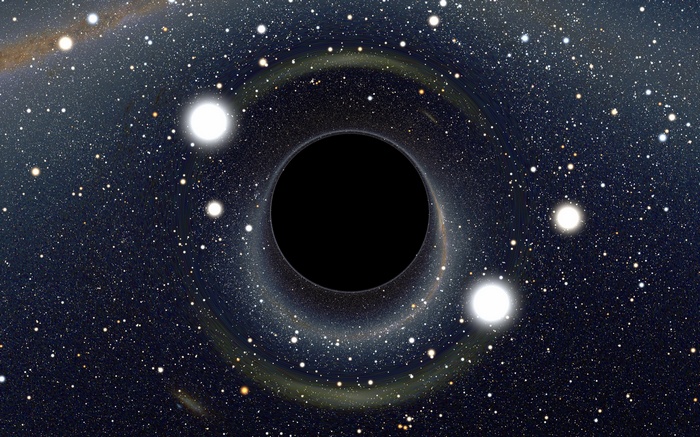 Black hole in space with stars and galaxies