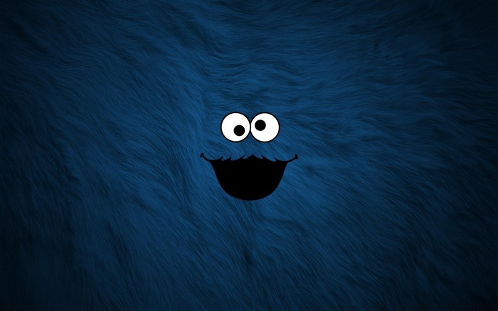 Cookie Monster face on blue fur background
