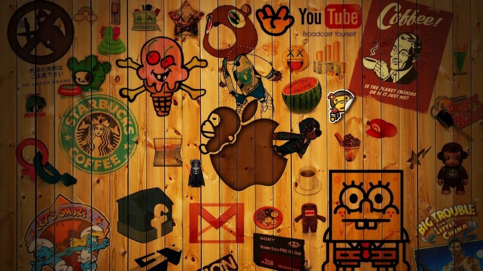 Collage of pop culture icons on a wooden wall