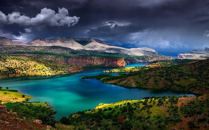 Turquoise river winding through mountains in Turkey