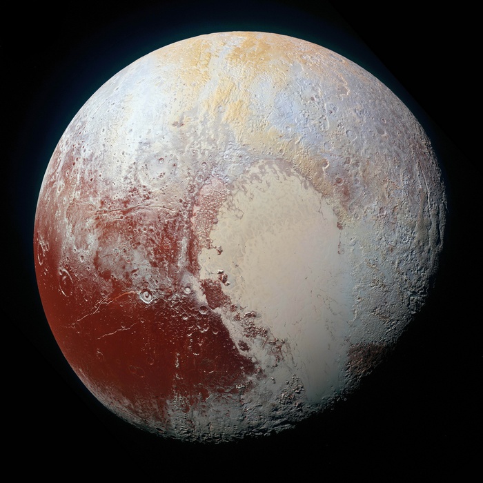 Pluto dwarf planet with red and white regions