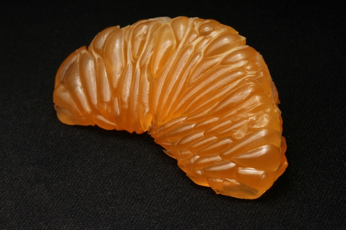 Close-up of a peeled orange segment