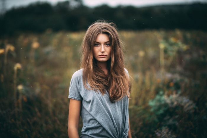 Portrait of a woman in a field