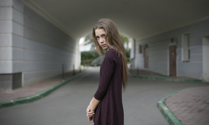 Ksenia Kokoreva in a dark dress