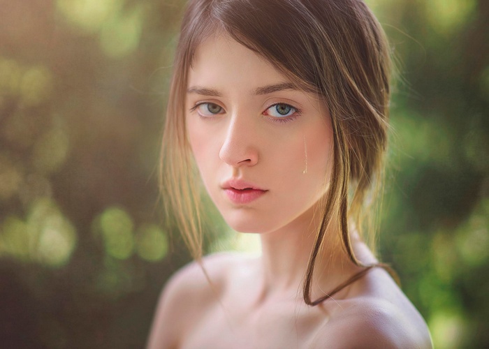 Portrait of a young woman with heterochromia