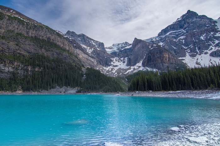 Turquoise lake and snow-capped mountains