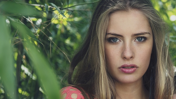 Camille Rochette with blonde hair and blue eyes