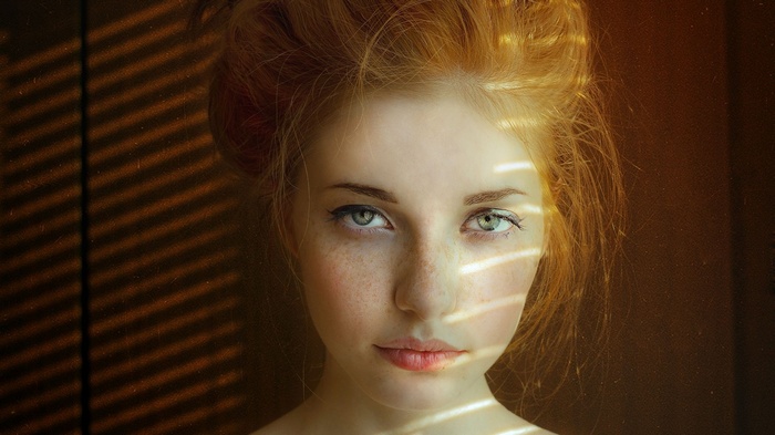 Redhead woman with freckles