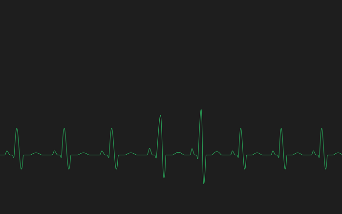 Green electrocardiogram line on black background