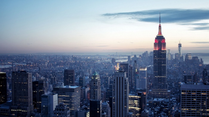 Empire State Building in New York City skyline at dusk