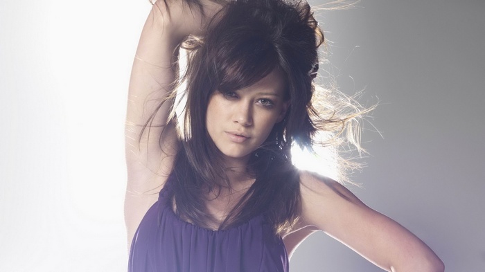 Hilary Duff with hands on head