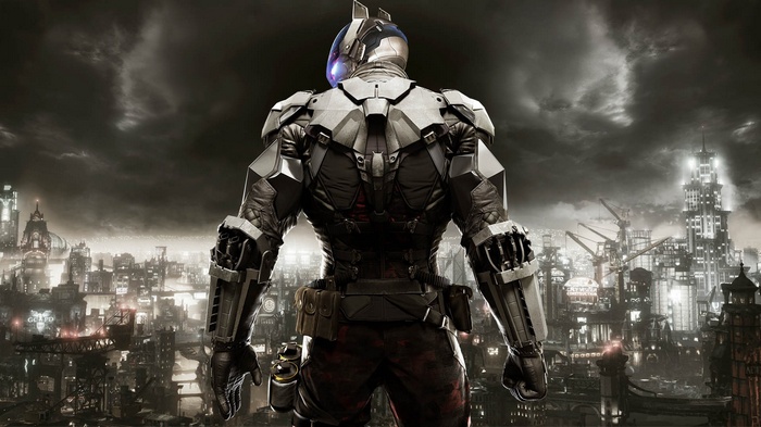 Batman in his Arkham Knight suit overlooking a cityscape
