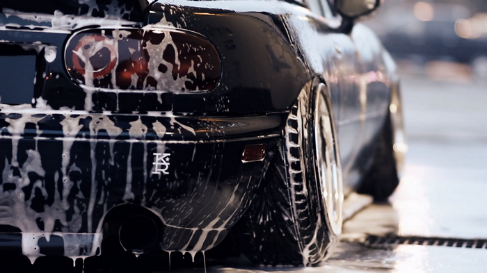 Mazda MX-5 Miata covered in soap suds