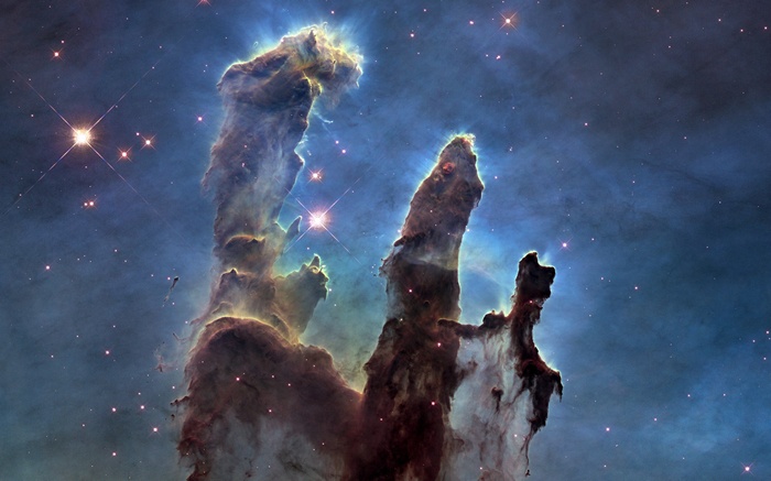 The Pillars of Creation nebula in space