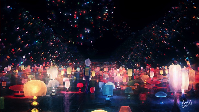 A person stands in a field of colorful lanterns