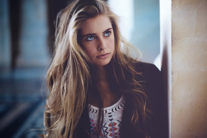 Camille Rochette with blonde hair and blue eyes