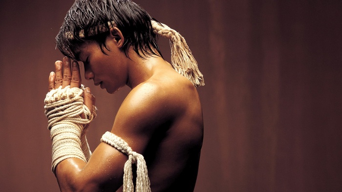 Tony Jaa in Ong-Bak with hands pressed together