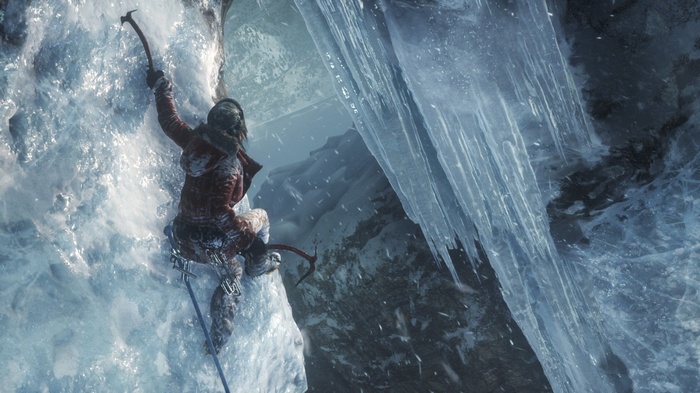 Lara Croft climbing an icy cliff in Rise of the Tomb Raider