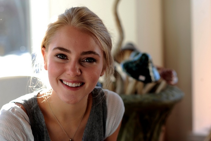 AnnaSophia Robb smiling indoors