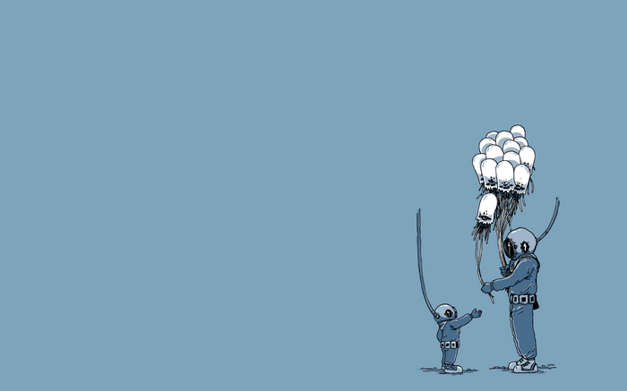 Two divers with a bunch of jellyfish balloons