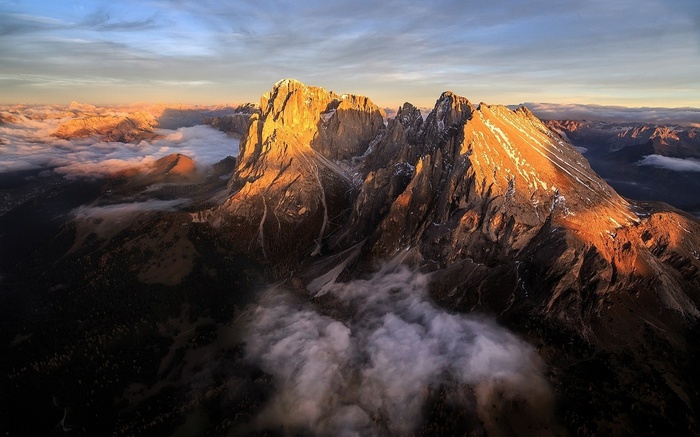 Aerial view of the Dolomites mountains in Italy at sunrise