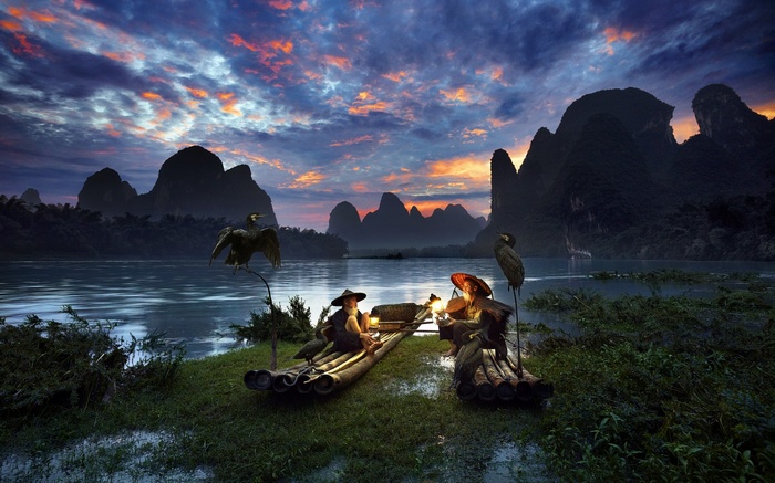 Fishermen with Cormorants on a River in Guilin, China