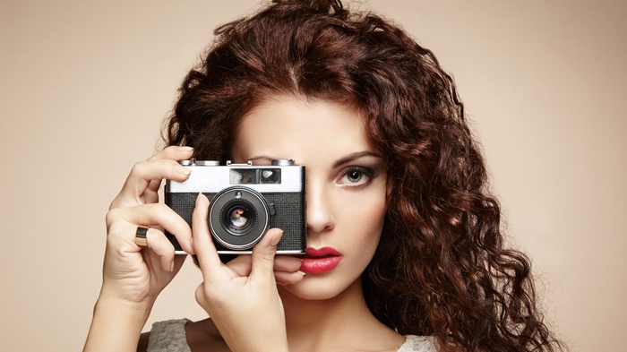 face, makeup, camera, long hair, open mouth, looking at viewer, red lipstick, hands, brunette, simple background, tank top, curly hair, women, model, portrait, Lorde