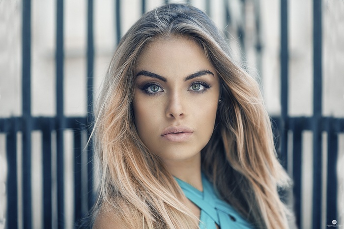 Portrait of a blonde woman with blue eyes