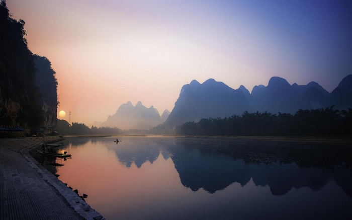 Misty Mountains and River at Sunrise in China