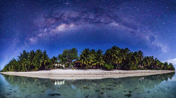 Aitutaki island under the Milky Way galaxy