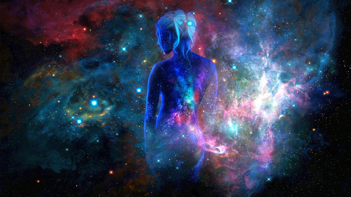 Woman's silhouette filled with a galaxy