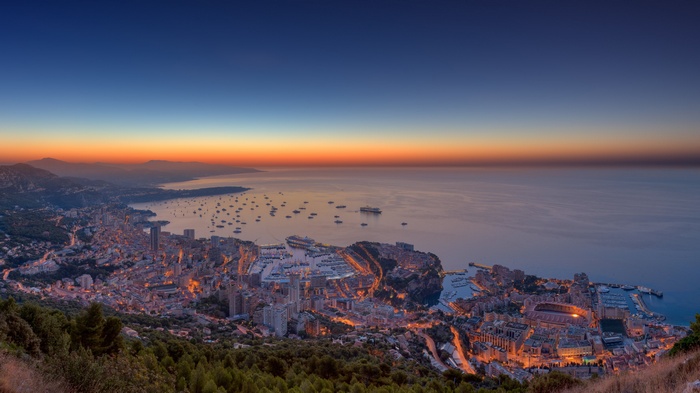Monaco cityscape at sunset overlooking the sea