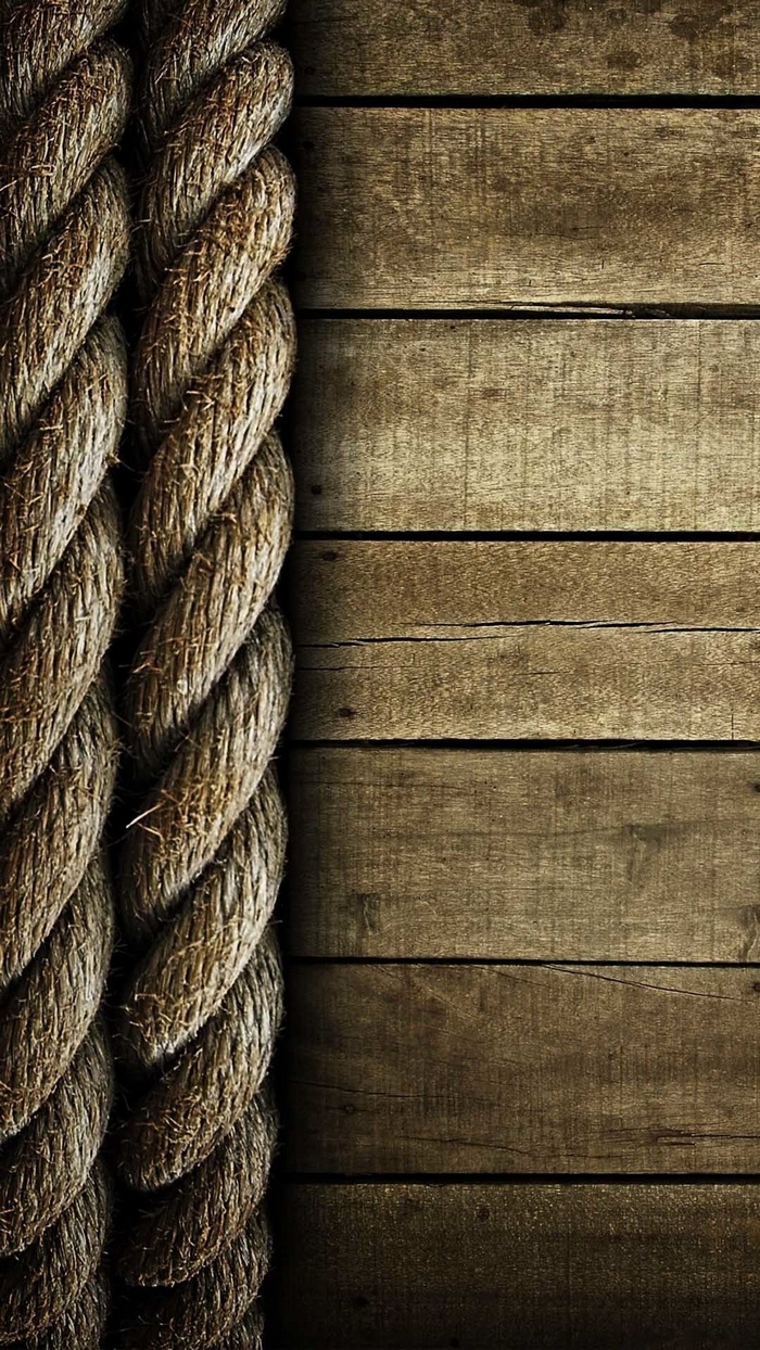 Thick rope on a wooden surface